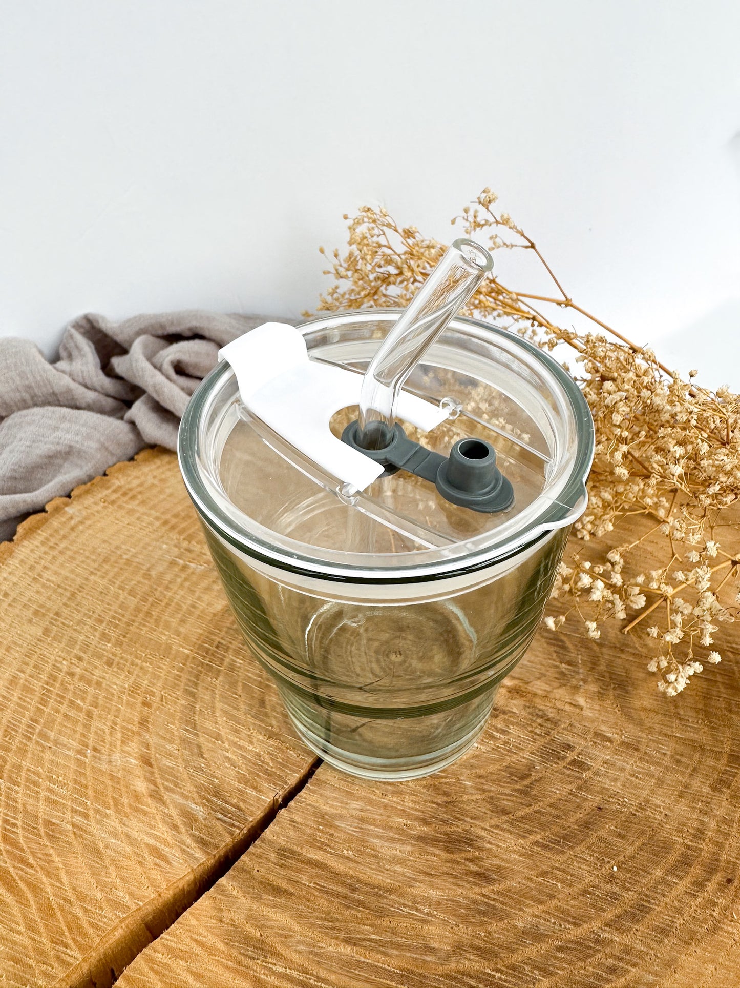 Tasse de transport en verre avec manchon