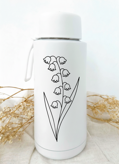 Bouteille isotherme blanche personnalisée avec fleur de naissance